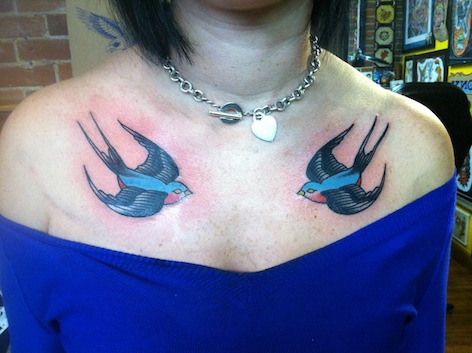 Swallows Chest Tattoos done by Tony Sellers.